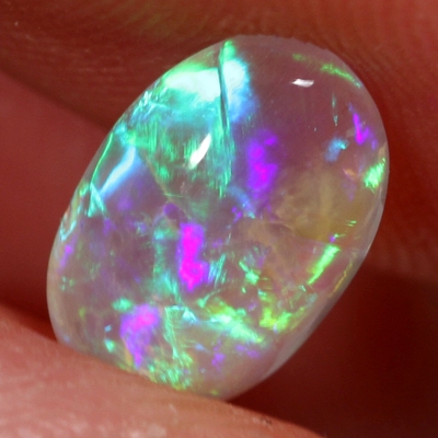SOLID CRYSTAL OPAL Bright rolling flashes throughout